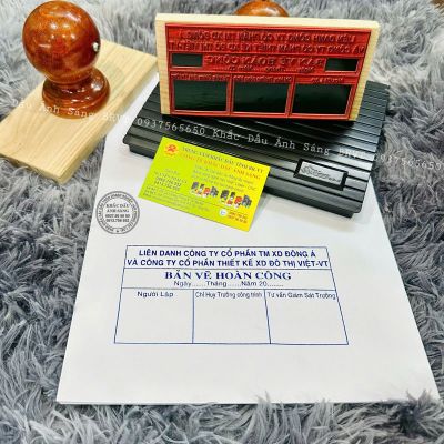 Khắc dấu hoàn công chấm mực đóng